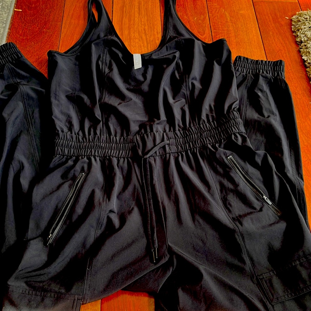 Athleta one piece jumper size small.  Never worn - great condition.